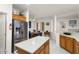 Kitchen featuring stainless steel appliances, breakfast nook, and ample storage at 16974 W Marcos De Niza Dr, Surprise, AZ 85387