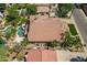 Stunning aerial view of a tile roof home featuring a private pool and lush landscaping at 1808 S Sailors Way, Gilbert, AZ 85295