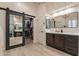 Large primary bathroom featuring modern vanity, closet, and separate shower at 1808 S Sailors Way, Gilbert, AZ 85295