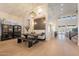 Open dining area showcasing a large wooden table, stylish lighting, and access to the living area at 1808 S Sailors Way, Gilbert, AZ 85295