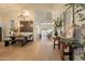 Open floor plan with dining table featuring modern lighting at 1808 S Sailors Way, Gilbert, AZ 85295
