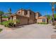 Spacious three car garage with large drive way and desert landscaping at 1808 S Sailors Way, Gilbert, AZ 85295