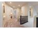 Hallway with carpet, access to many rooms, and a small table with chairs at 1808 S Sailors Way, Gilbert, AZ 85295