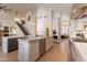 Expansive kitchen with a large island, stainless steel appliances, and an open layout, perfect for entertaining at 1808 S Sailors Way, Gilbert, AZ 85295