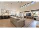 Open concept living area showcasing a modern kitchen, dining space, and comfortable seating at 1808 S Sailors Way, Gilbert, AZ 85295