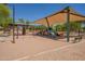 Shaded community playground featuring swings, slides, and climbing structures providing a fun and safe play area at 1808 S Sailors Way, Gilbert, AZ 85295