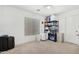 Bedroom with carpet, window with blinds, closet and storage at 18903 N Shelby Dr, Maricopa, AZ 85138