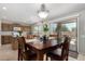 Bright dining area adjacent to the kitchen with backyard access at 18903 N Shelby Dr, Maricopa, AZ 85138