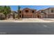 Charming two-story home with a spacious driveway and low-maintenance landscaping at 18903 N Shelby Dr, Maricopa, AZ 85138