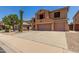 Beautiful home with a tile roof, two-car garage, and desert landscaping at 18903 N Shelby Dr, Maricopa, AZ 85138