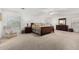 Large main bedroom with lots of natural light and an attached bath at 18903 N Shelby Dr, Maricopa, AZ 85138