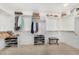 Walk-in closet featuring built-in shelves and ample storage space at 18903 N Shelby Dr, Maricopa, AZ 85138