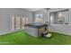 Relaxing hot tub room with turf at 18916 W Laurel Ln, Surprise, AZ 85388