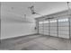 Spacious garage featuring a new garage door at 18916 W Laurel Ln, Surprise, AZ 85388