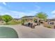 Community picnic shelter with shade, a table and seating at 18916 W Laurel Ln, Surprise, AZ 85388