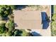 Aerial view of the house highlighting the roof, surroundings and driveway at 19006 E Karsten Dr, Queen Creek, AZ 85142
