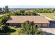 Overhead view of the home showing the roof, mature trees, and surroundings at 19006 E Karsten Dr, Queen Creek, AZ 85142