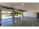 The garage features an epoxy floor, an automatic door, and ample space at 19006 E Karsten Dr, Queen Creek, AZ 85142