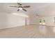 Bright living room with light vinyl floors, vaulted ceilings and French doors at 19006 E Karsten Dr, Queen Creek, AZ 85142