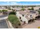 Lovely home featuring a Spanish tile roof, a two-car garage, and a well-maintained yard in a quiet neighborhood at 2004 E Heartwood Ln, Phoenix, AZ 85022