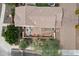 Aerial view of a patio featuring an outdoor table, multiple chairs, and landscaping at 2004 E Heartwood Ln, Phoenix, AZ 85022