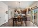 Well-lit kitchen area featuring an island with a granite countertop and stainless steel appliances at 2004 E Heartwood Ln, Phoenix, AZ 85022