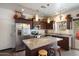 Kitchen featuring modern appliances, stylish countertops, and a functional island for meal prep at 2004 E Heartwood Ln, Phoenix, AZ 85022