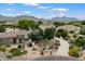 Beautiful home featuring desert landscaping, a circular driveway, and gorgeous mountain views at 21205 E Excelsior Ave, Queen Creek, AZ 85142