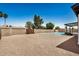 This home features a sparkling pool and low maintenance desert landscaping at 2124 E Boston St, Chandler, AZ 85225
