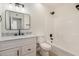 This bathroom offers a new vanity with marble countertop and matte black fixtures at 2124 E Boston St, Chandler, AZ 85225