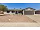 Charming home featuring an attached garage, manicured landscaping, and a welcoming front facade at 2124 E Boston St, Chandler, AZ 85225
