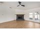 Cozy living room featuring a classic fireplace and ample space at 2124 E Boston St, Chandler, AZ 85225
