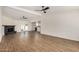 Spacious living room with a fireplace, backyard access, and an open layout to the kitchen at 2124 E Boston St, Chandler, AZ 85225