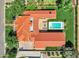 Aerial view of property shows a large estate with a red tile roof, pool, and expansive manicured lawns at 2339 E Virgo Pl, Chandler, AZ 85249