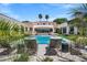 Inviting backyard oasis with a sparkling pool, lounge chairs, and lush greenery, creating a private retreat at 2339 E Virgo Pl, Chandler, AZ 85249
