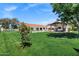 Lush backyard featuring a pool, covered patio, and ample green space, ideal for outdoor enjoyment at 2339 E Virgo Pl, Chandler, AZ 85249