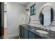 Elegant bathroom featuring dual vanities, marble countertop, and modern fixtures at 2339 E Virgo Pl, Chandler, AZ 85249