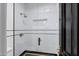 Walk-in shower boasting white subway tile, frameless glass door, and bronze fixtures at 2339 E Virgo Pl, Chandler, AZ 85249