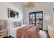 Inviting bedroom with a plush bed, stylish lighting, and a serene view at 2339 E Virgo Pl, Chandler, AZ 85249