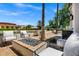 Inviting outdoor area with a brick fire pit, comfortable seating, and lush landscaping at 2339 E Virgo Pl, Chandler, AZ 85249