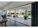 Seamless indoor-outdoor living with folding glass doors, leading to backyard at 2339 E Virgo Pl, Chandler, AZ 85249