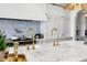 Features a large marble island with double sinks and elegant brass fixtures at 2339 E Virgo Pl, Chandler, AZ 85249