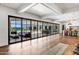 The large bi-fold doors offer panoramic views and easy access to the outdoor area at 2339 E Virgo Pl, Chandler, AZ 85249