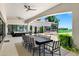 Elegant outdoor dining area with a large table, comfortable seating, and a covered patio at 2339 E Virgo Pl, Chandler, AZ 85249