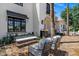 Comfortable outdoor seating area with brick flooring and elegant seating arrangements at 2339 E Virgo Pl, Chandler, AZ 85249