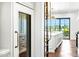 Walk-in pantry features custom cabinets, a ladder, and access to the kitchen with an island and a view at 2339 E Virgo Pl, Chandler, AZ 85249