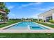 Sparkling pool and spa surrounded by lush landscaping, with lounge chairs and umbrellas for poolside relaxation at 2339 E Virgo Pl, Chandler, AZ 85249