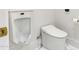 Modern toilet with a bidet in a well-lit, luxurious bathroom at 2339 E Virgo Pl, Chandler, AZ 85249
