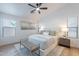 Serene bedroom showcasing natural light, contemporary decor, and a cozy atmosphere at 23676 W Parkway Dr, Buckeye, AZ 85326