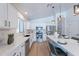 Modern kitchen featuring white cabinetry, stainless steel appliances, and stylish countertops at 23676 W Parkway Dr, Buckeye, AZ 85326